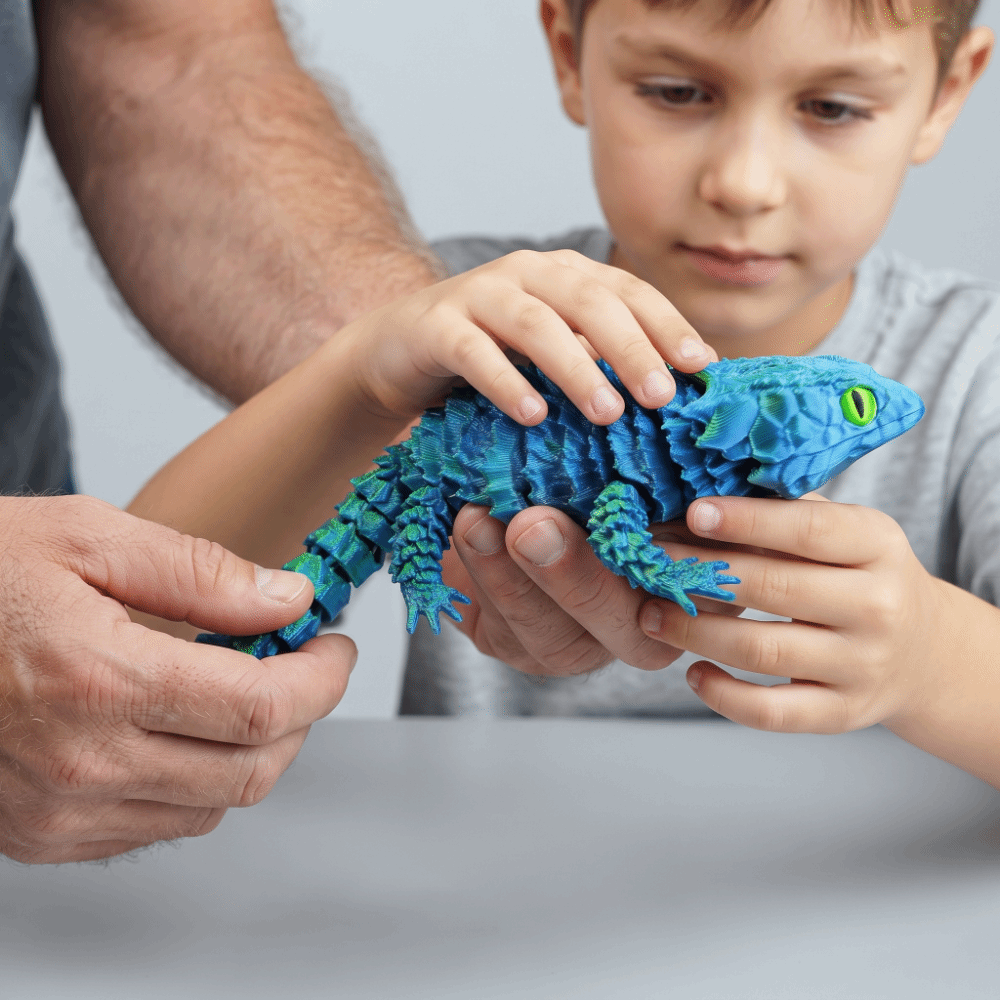 可動関節付き、3Dプリント製のカラフルなトカゲのフィギュア。 - 3D Printing Lizard のレビューと価格